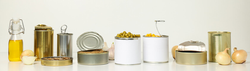 Canned food in blank metal jars, concept of canned food