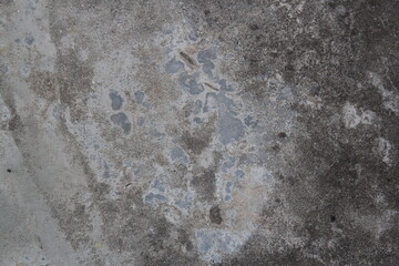 Grungy cement wall background, aged sand wall surface, weathered rustic wall backdrop