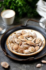 Homemade salted dried apricot kernels.