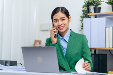 Young busy asian business woman manager, lawyer doing bookkeeping audit graph documents checking Bank Reconciliation, Base Stock, Last Invoice Price, Freight, Drop Product or Drop Section Decisions