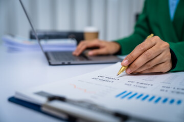 Young busy asian business woman manager, lawyer doing bookkeeping audit graph documents checking...