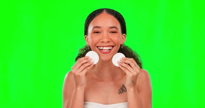 Beauty, cotton pads and woman on green screen for wellness, facial treatment and silly expression. Skincare, spa and portrait of girl with comic, emoji face and swab for natural cosmetics in studio