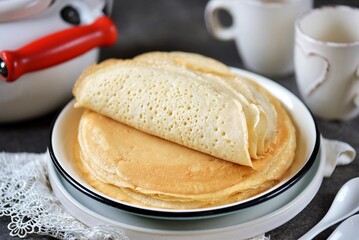 Semolina yeast pancakes with holes.