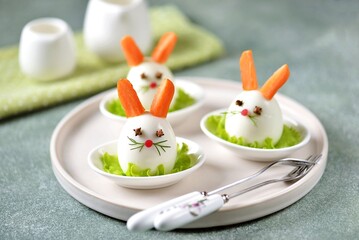 Cute idea for children's breakfast from boiled eggs in the form of a rabbit 