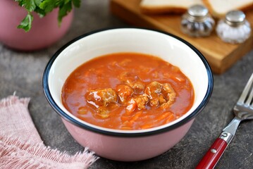 Beef goulash with tomato paste and vegetables