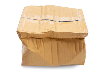 Damaged cardboard box on white background.