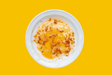Dirty dish on yellow background. Top view