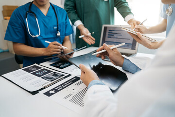 Medical team working on digital tablet healthcare doctor technology tablet using computer analyzed...