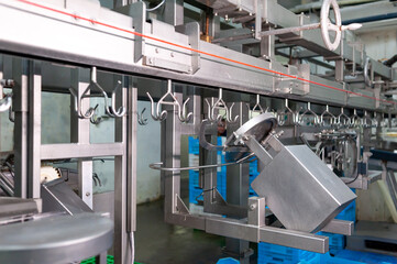 Modern poultry processing plant with automated systems, stainless steel equipment, and strict hygiene control ensuring high-quality meat production
