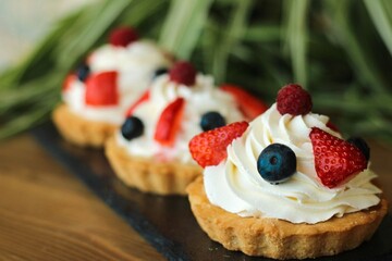 cake with strawberries and blueberries