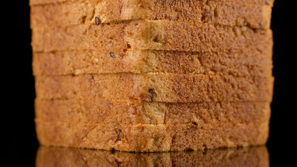 Slices toast bread isolated on black background