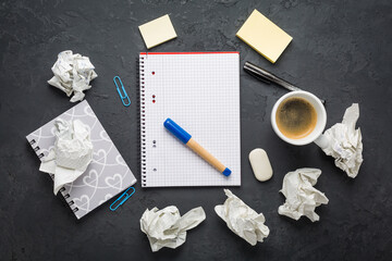 Crumpled wads, sheet of white paper, coffee and idea, brainstorming concept