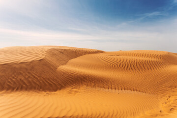 Scenic view of the dunes in the desert on a sunny summer day.