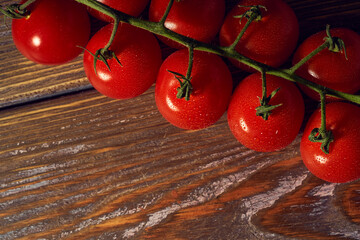 Fresh organic cherry tomatoes on a kitchen table
