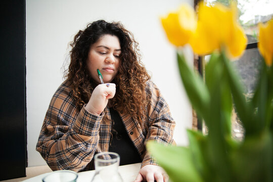 Plus-sized Sri Lankan woman with vitiligo working from home