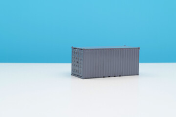 Gray cargo container on the table