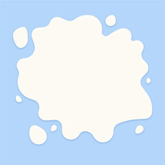 Milk splash drops on blue background for text.