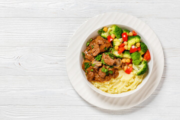 beef mushrooms stew with mashed potato and salad
