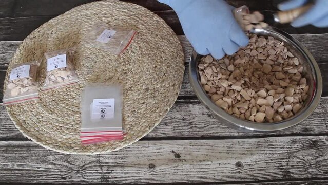 Packing brown edible clay in small packs