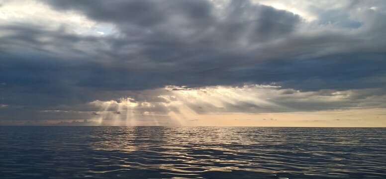 Even though the clouds obscure it, the light still shines down.
