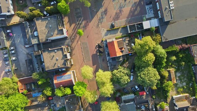 Top down aerial of a calm town center in summer