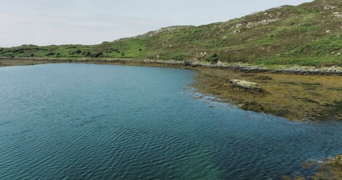Drone shot of the edge of an estuary in Northern Scotland where seals are present
