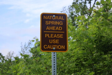 Natural spring ahead sign