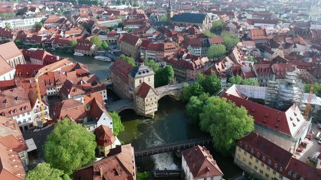 Bamberg Altes Rathaus. Aerial view of the Old town of Bamberg with the Historic Town Hall on the Regnitz river, morning