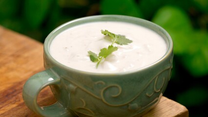 Savory Delight: Top Closeup View of Clam Chowder in a Copper Pan, a Creamy Seafood Comfort
