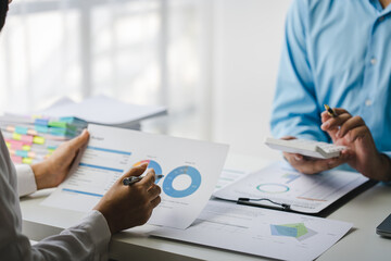 Portrait of a woman working on a tablet computer in a modern office. Make an account analysis report. real estate investment information financial and tax system concepts