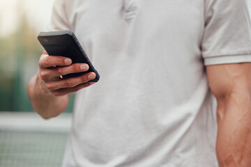 Man, hands and phone for social media, communication or chatting and typing in sports networking on tennis court. Hand of male person or sport athlete on mobile smartphone for online chat or texting