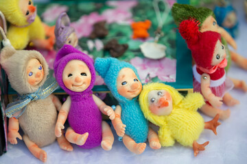 Fototapeta na wymiar Funny multicolored handmade dwarf dolls.