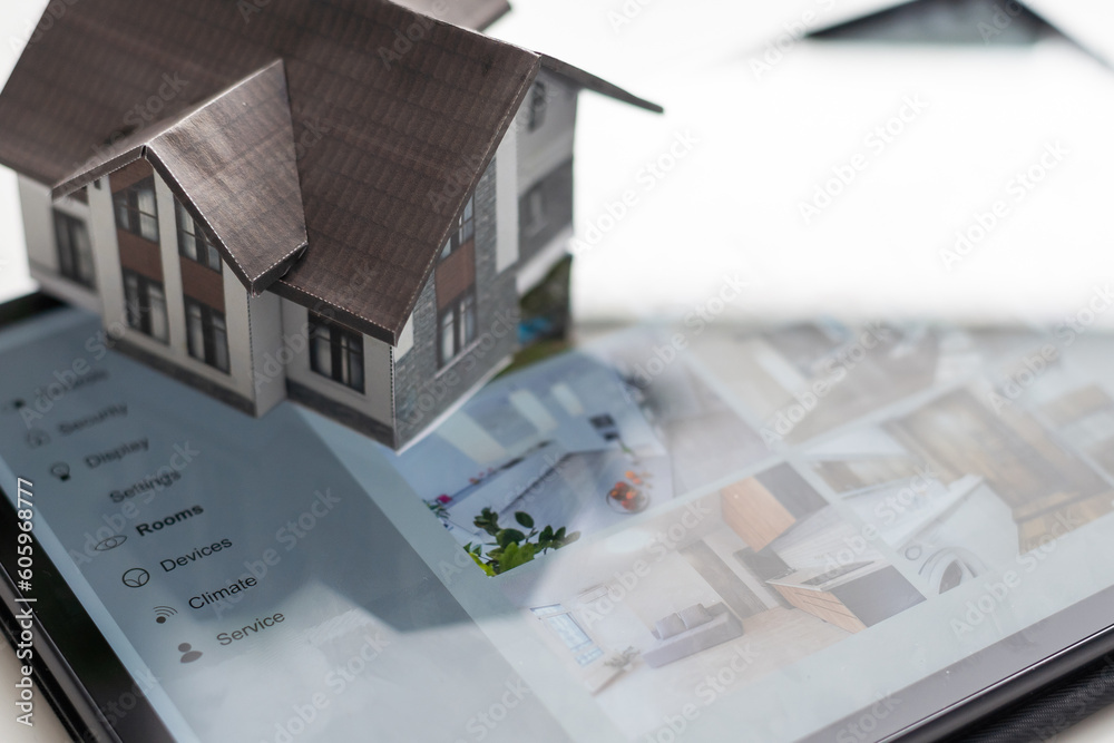 Poster small house model is on table and icons home electronics devices connecting with wireless. smart hom