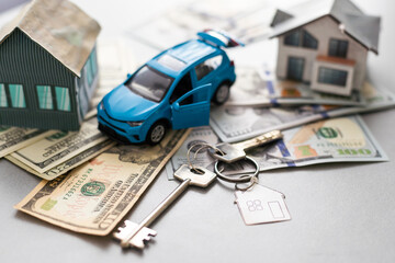 Model house and car with your deposit money. Real estate and mortgage investment concept.