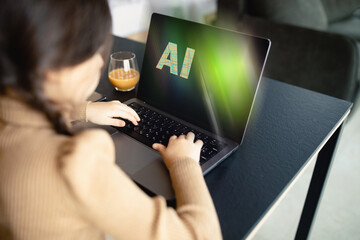 Caucasian little girl using a laptop PC. Education technology. EdTech. AI, futurism