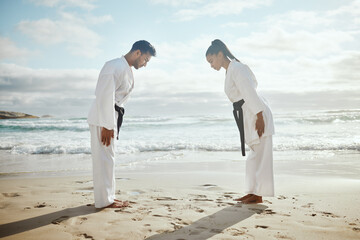 Beach, bow and people at karate training for exercise, sport and ready to start. Fitness, creative...
