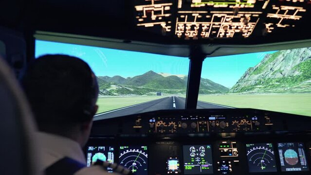 Pilots driving inside a plane with illuminated buttons for a flight simulator on airport runway