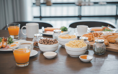 Breakfast served food with beverage coffee, orange juice on table in the morning at home, Fresh and bright continental breakfast healthy