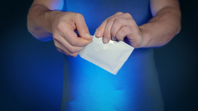 Rip white plastic protective and airtight foil containing sterile medical content for self-testing