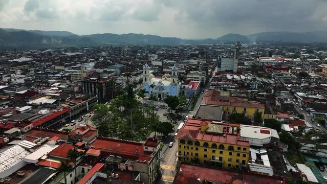 Drone shot circling the Immaculate Conception Cathedral, in cloudy Cordoba, Veracruz, Mexico