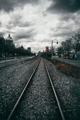 Vertical shot of an empty railroad in Montreal, Ontario, Canada on a gloomy day