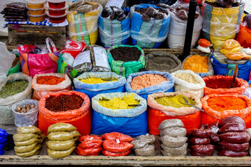 Fototapeta premium Bags of colourful, colorful spices in Otavalo market, Ecuador