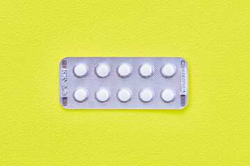 Hair Loss Treatment Medicines on Green Background