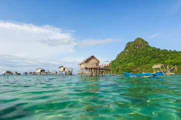 Beautiful landscapes view borneo sea gypsy water village in Bodgaya Mabul Island, Semporna Sabah, Malaysia.