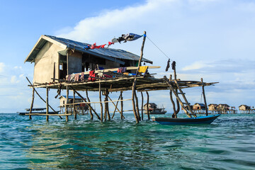 Beautiful landscapes view borneo sea gypsy water village in Bodgaya Mabul Island, Semporna Sabah, Malaysia.