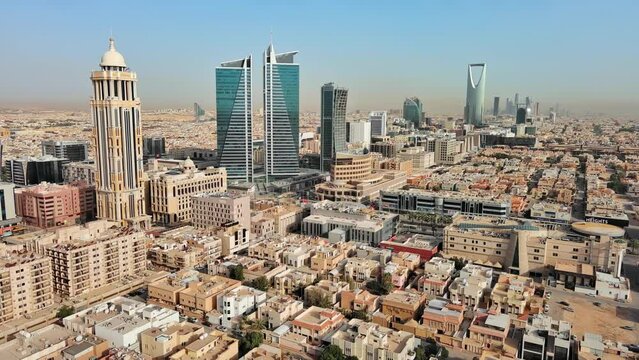 Riyadh: Aerial view of capital city of Saudi Arabia, modern city skyline, Al Olaya financial district with skyscrapers - landscape panorama of Arabian Peninsula from above