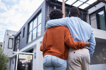 Love, hugging and back of couple by their new home, property or real estate standing together....