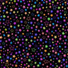 Seamless pattern of bright multi-colored stars on a black background