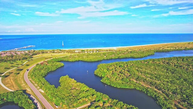 Drone view over the waters and greenery of Fort De Soto Park before the blue skyline