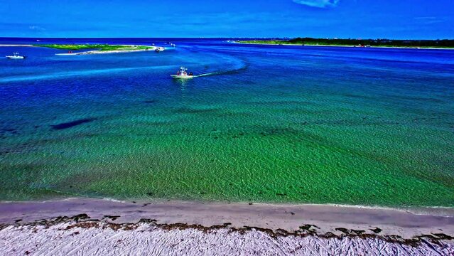 Drone view over the waters and coasts of Fort De Soto Park before the blue skyline